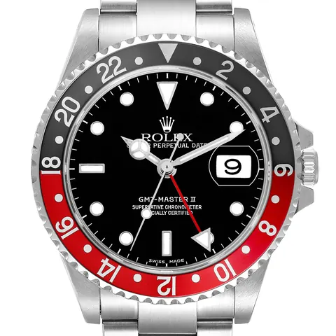 Black dial and red and black "Coke" bezel of a Rolex GMT-Master II 16710