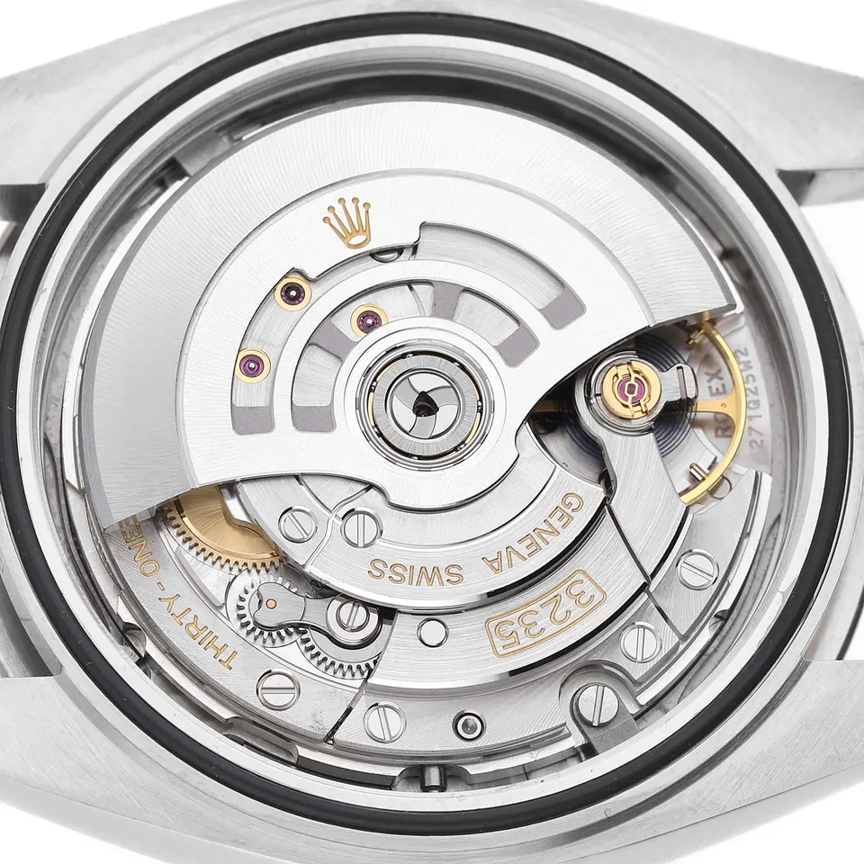 Rolex calibre 3235 automatic movement seen through an open caseback