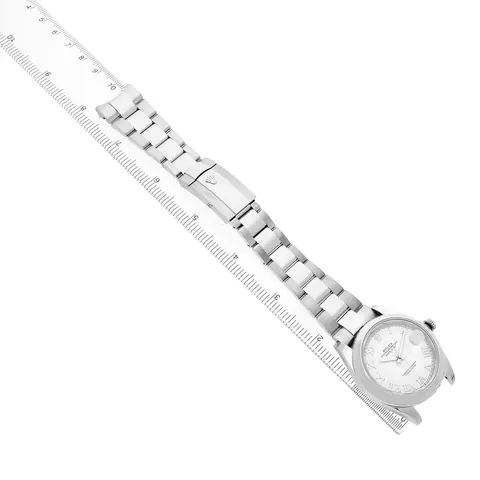 Rolex Datejust 41 laid next to a ruler to show bracelet and case size